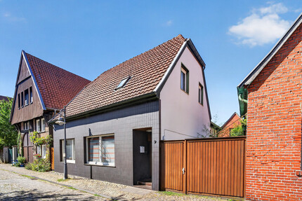 Wo Geschichte auf neue Möglichkeiten trifft – Einfamilienhaus mit Nebengebäude in Burgsteinfurt!