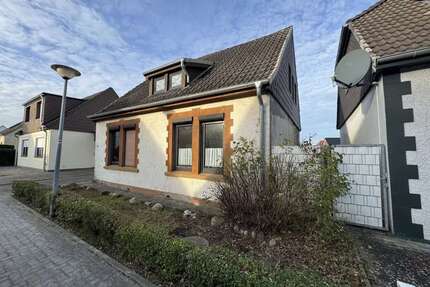 Haus zum Kaufen in Schortens Middelsfähr 99.850,00 € 108.8 m² - Schortens / Middelsfähr