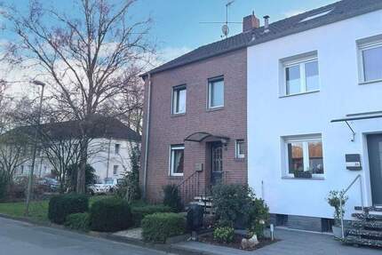 Sonnig und solide: Reihenendhaus mit 5 Zimmern, Terrasse und Garten - in Rheinnähe - Duisburg Hochemmerich