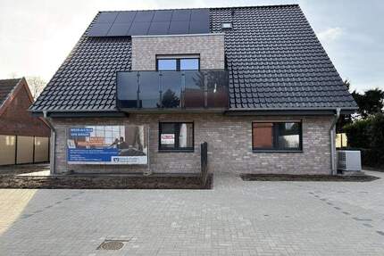 Genuss eines Neubaus! Moderne Erdgeschosswohnung im Doppelhaus in Nordwalde