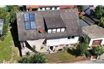 Haus zum Kaufen in Adelsdorf 630.000,00 € 379.25 m²