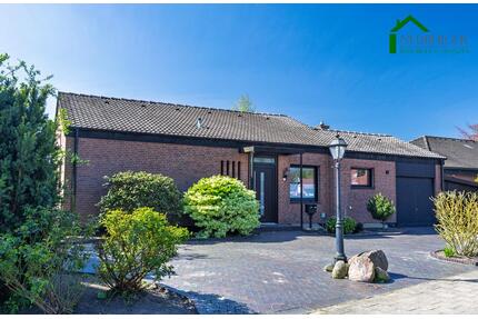Moderner Wohntraum in der Hengelage: Renovierter Bungalow mit Wintergarten, Garage und großem Garten - Quakenbrück