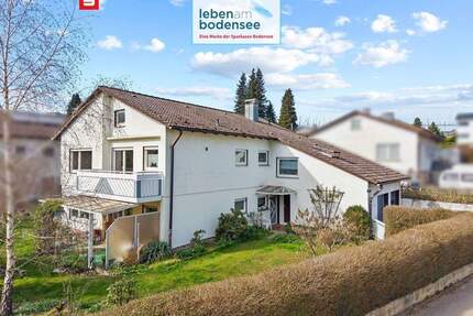 Einfamilienhaus mit Einliegerwohnung, Balkon, Garten und 2 Garagen auf großem Grundstück - Tettnang