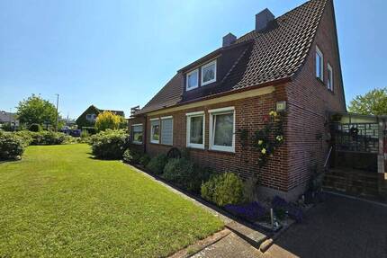 Gepflegtes Einfamilienhaus im Zentrum von Vögelsen mit Garage, Carport und schönem Garten, Keine Erbpacht!