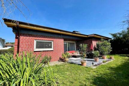 Fröndenberg-Frömern: Freistehender Bungalow mit Garage in familienfreundlicher Lage!