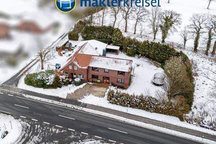 Zwei aneinanderliegende gepflegte Wohnhäuser auf großem Grundstück am Rande von Leerhafe! - Wittmund / Leerhafe