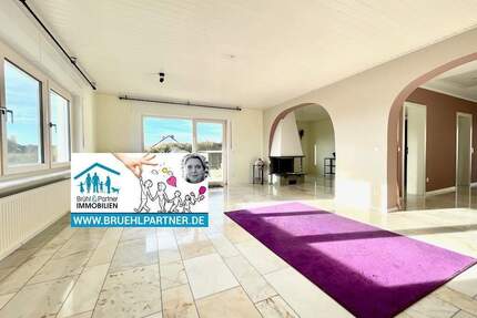 Modernisierter Bungalow mit ausgebautem Untergeschoss und sonnigem Garten - ziehen Sie einfach ein - Daxweiler