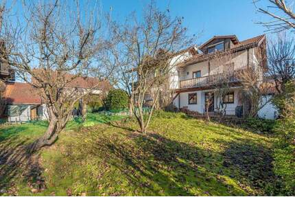 AIGNER - Charmante Doppelhaushälfte mit idyllischem Garten mit Westausrichtung in Weßling