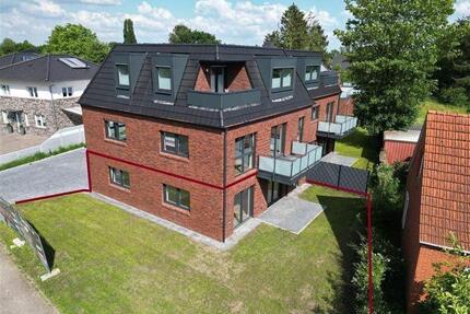 Erdgeschosswohnung mit Küche, eigenem Garten, PV Anlage & Wärmepumpe! - Westoverledingen