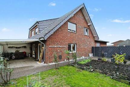 Neuer Preis! Doppelhaushälfte in Geseke-Langeneicke mit Garten, Terrasse sowie Büro und Hobbyraum