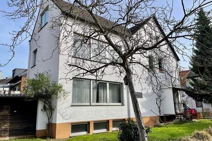 Solides und sonniges Zuhause: Doppelhaushälfte, 7 Zimmer, großer Garten, 3 Garagen - Bonn Vilich