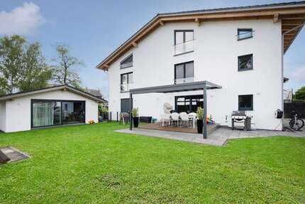 Haus zum Kaufen in Putzbrunn 2.690.000,00 € 426 m²