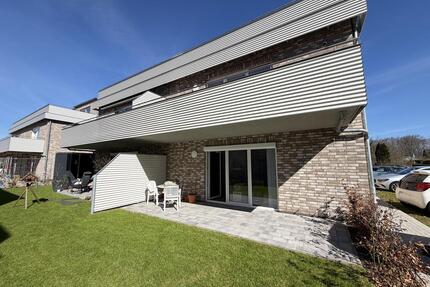 Tarp: helle und großzügige Erdgeschosswohnung mit Terrasse