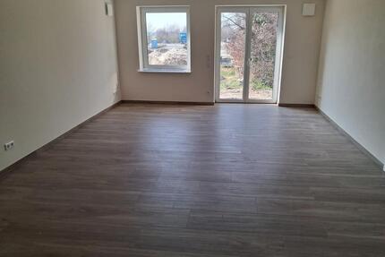 Neubau – Erstbezug! Moderne EG-Wohnung mit Terrasse & Tiefgarage - Grasberg