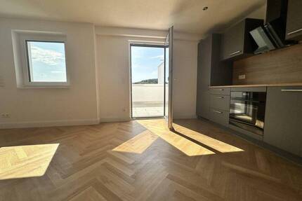 Neubaujuwel in Südlage: Exklusive 75 m² Wohnung mit Fernblick ins Grüne - Aichtal