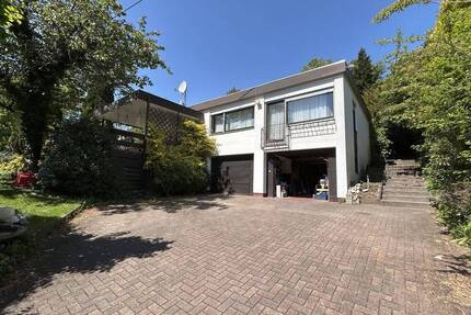 Sanierungsbedürftiger Bungalow aus Nachlass mit Wintergarten und 2 Garagen - aktuell vermietet - Neunkirchen/Wellesweiler