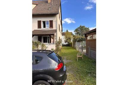 Grenznahes Mehrfamilienhaus mit 9 Wohneinheiten, großem Garten und viel Potential - Weil am Rhein