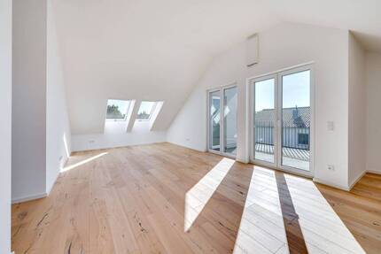AIGNER - Erstbezug: Moderne, lichtdurchflutete Dachgeschosswohnung in Maisach!
