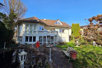 Exklusives Einfamilien-Haus mit Einliegerwohnung, Wintergarten, Sauna und parkähnlichem Garten - Ottweiler Fürth