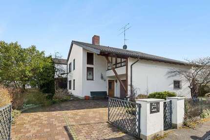 Haus zum Kaufen in Ismaning 1.400.000,00 € 282 m²