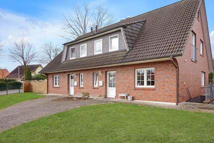 Ein stilvolles Doppelhaus zum Kauf in Jesteburg! - viel Platz, Garten & Carport!