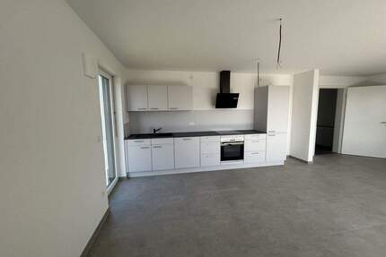 Erstbezug: Moderne Neubauwohnung im Erdgeschoss mit Einbauküche und Garten - Neudenau