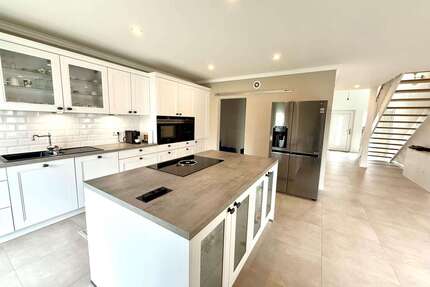 Haus zum Kaufen in Lingenfeld 650.000,00 € 187.17 m²