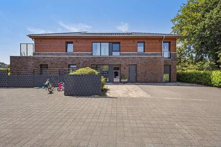 Neuwertige Erdgeschosswohnung mit Südterrasse und Garten – modernes Wohnen in Sittensen