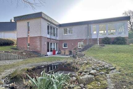 Molfsee - Außergewöhnlich gepflegte Immobilie mit Wintergarten, viel Platz und großem Grundstück