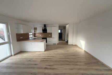 Neubau Erstbezug - Hochwertige Wohnung auf 2 Ebenen mit Garage in Toplage 