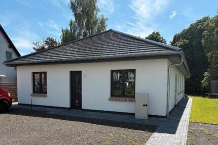 Neubau-Bungalow in Dummerstorf mit Einliegerwohnung u. Parkblick