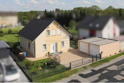 Traumhaftes Einfamilienhaus mit Doppelgarage, großem Grundstück und Erdwärme in Limbach-Oberfrohna