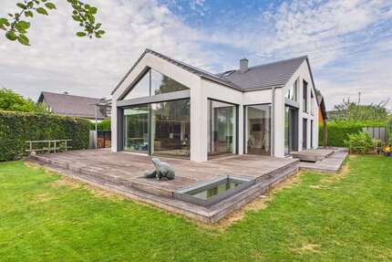 Haus zum Mieten in Ismaning 10.100,00 € 402 m²
