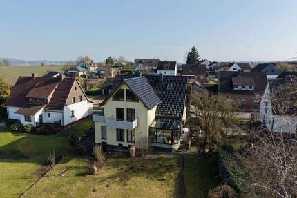 Familienfreundliches Zweifamilienhaus mit Garten im Ortsteil von Hessisch Oldendorf