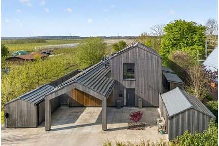 Haus zum Kaufen in Hollern-Twielenfleth 1.499.000,00 € 304.6 m²