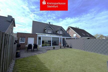 Lichtdurchflutetes Wohnen mit Kamin und Wintergarten - Emsdetten