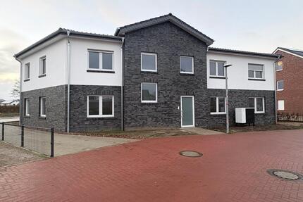 Neubau 3 Zimmer Erdgeschosswohnung mit Terrasse, Gartenanteil und EBK - Harpstedt