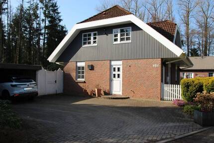 RESERVIERT - Besonderes Einfamilienhaus mit neuer Heizung (2026) und Doppelcarport in Waldrandlage - Tostedt