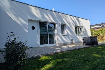 Mietwohnung 2,5 Zimmer EG mit großer Terrasse und Gartenanteil - Täferrot