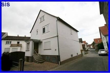 Einfamilienhaus mit Doppelgarage, Nebengebäude u. sep. Gartengrundstück in 34599 Neuental-Waltersbrück zu verkaufen