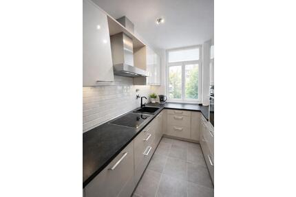 Möblierte 2-Zimmer-Wohnung mit Wintergarten, TG & Keller - Augsburg Antonsviertel