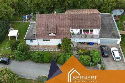 Vermietetes Zweifamilienhaus mit viel Platz und eigenem Brunnen in ruhiger Lage von Altenkunstadt