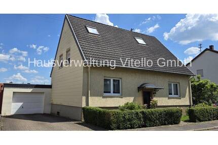 Charmantes Einfamilienhaus mit Garten und Garage in attraktiver Lage! - Saarbrücken / Gersweiler