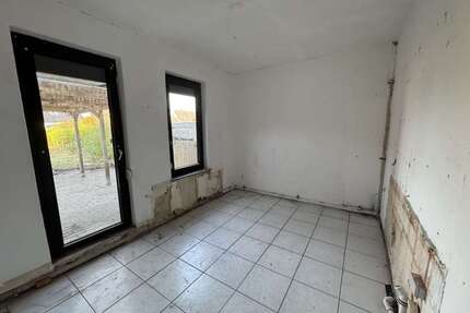 Haus zum Kaufen in Schortens Middelsfähr 139.850,00 € 108.8 m² - Schortens / Middelsfähr