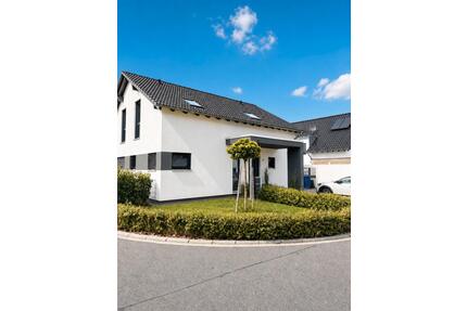 Einziehen statt selbst bauen: KfW-40-Haus in Asbach-Löhe