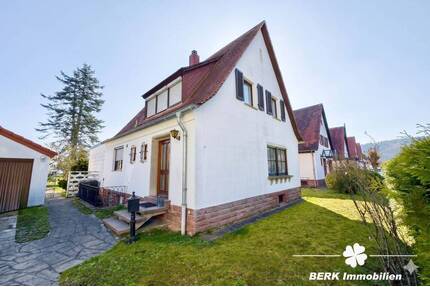 BERK Immobilien - Großzügiges Siedlungshaus mit Anbau & viel Potenzial in ruhiger Lage - Erlenbach am Main