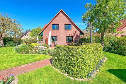 EINZIEHEN UND WOHLFÜHLEN: EINFAMILIENHAUS MIT MODERNER TECHNIK IN TOP-LAGE VON SITTENSEN