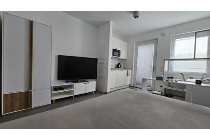 1-Zimmer-Apartement mit kleiner Terrasse und Küche (oder auf Wunsch vollmöbliert) - Würselen