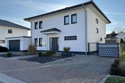 Haus zum Kaufen in Fernwald Annerod 760.000,00 € 166 m² - Fernwald / Annerod