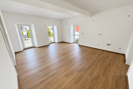 Wohnung zum Kaufen in Adelsdorf 299.500,00 € 65 m²